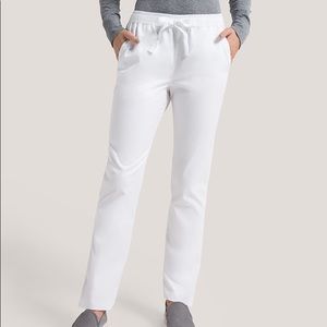 XS White Jaanuu skinny scrub pants